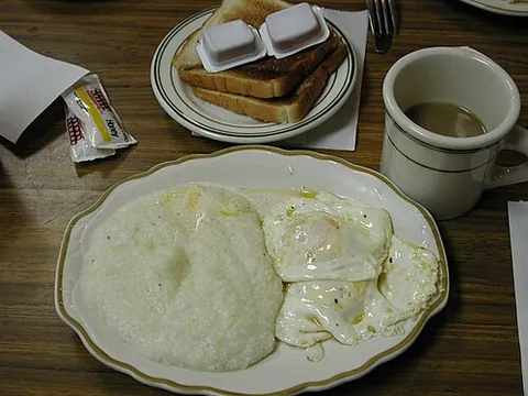 grits: coarsely ground hominy which is boiled and eaten, primarily in the Southern United States