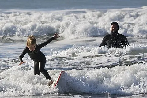 grom: a young surfer, wakeskater, wakeboarder, snowboarder, skimboarder, skateboarder, or kiteboarder