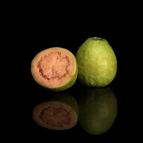 guava: a tropical tree or shrub of the myrtle family, Psidium guajava