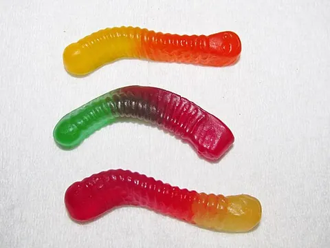 gummy worm: a confectionery made of gelatin and often, but not always, in the shape of a toy worm, and somewhat...