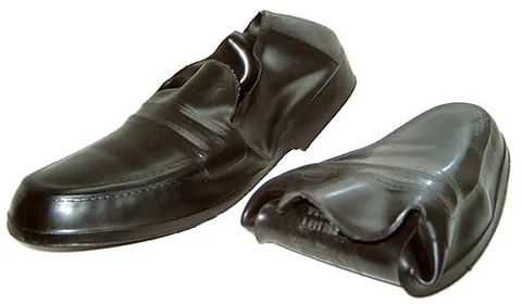 gumshoe: a sneaker or rubber overshoe