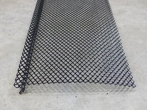 gutter guard: a cover that prevents leaves and debris from entering roof gutters