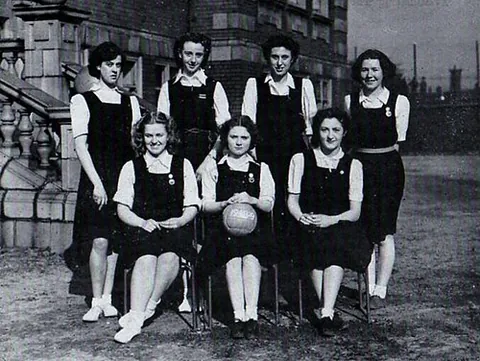 gymslip: a sleeveless tunic with a pleated skirt, most commonly seen as part of a girl's school uniform