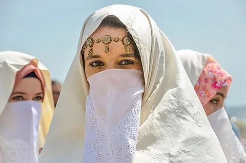haik: a covering for the head and body worn by Arabs