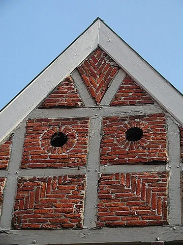 half-timbering: a method of construction using heavy timber beams, usually joined by tenon and mortice joints...