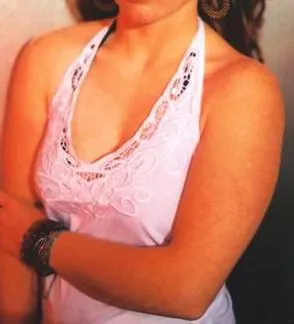 halter top: a style of sleeveless top with a single strap around the back of the neck (a halterneck)