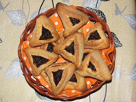 hamantaschen: traditional Ashkenazi three-cornered cookies eaten during the Jewish holiday of Purim. The filling...