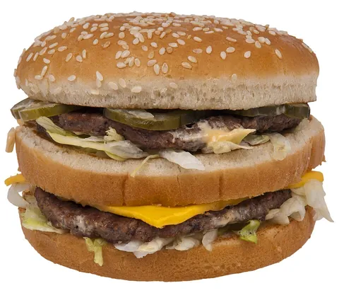 hamburger: a hot sandwich consisting of a patty of cooked ground beef or a meat substitute, in a sliced bun,...