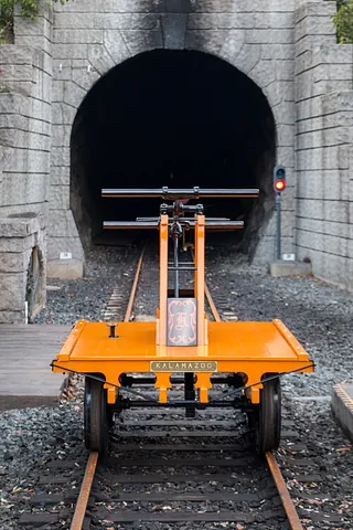 handcar: a light railroad car propelled by a hand-operated pumping mechanism