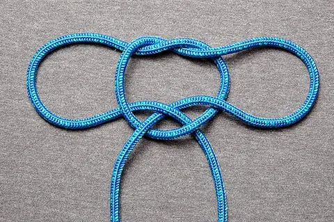 handcuff knot: a knot tied in the bight, having two adjustable loops in opposing directions, able to be tightened...