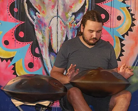 handpan: a type of steelpan that is played with the hands, typically resting on the player's lap