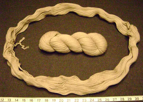 hank: a coil or loop of something, especially twine, yarn, or rope