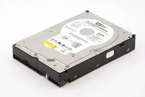 hard disk: one of a series of parallel magnetic recording disks in a drive unit, used for the recording and...