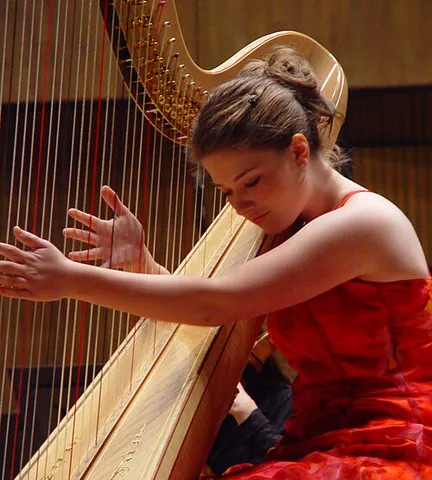 harpist: someone who plays a harp, especially a pedal harp
