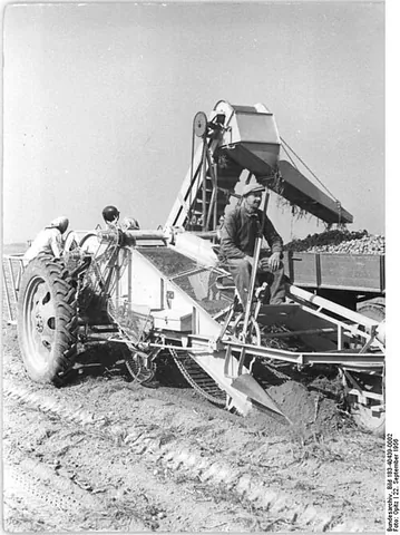 harvester: a person who gathers the harvest (harvests the crop)