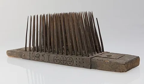 hatchel: a comb used to separate flax fibers