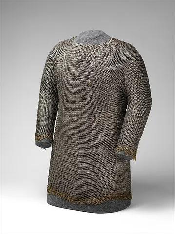 hauberk: a coat of mail; especially, the long coat of mail of the European Middle Ages, as contrasted with...