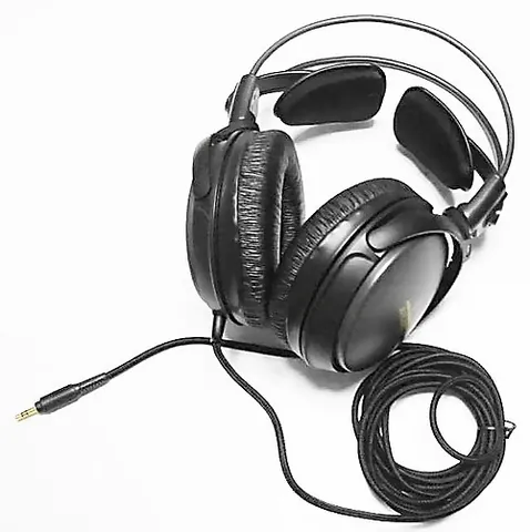 headphones: a pair of cushioned speakers worn over or in the ears so only the wearer can hear the sound