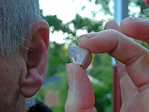 hearing aid: a device used to help the hard of hearing to hear sounds