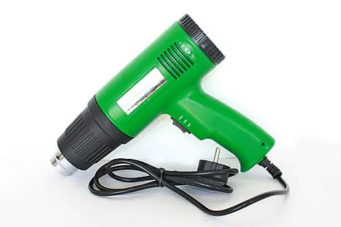 heat gun: a device used to emit a stream of hot air