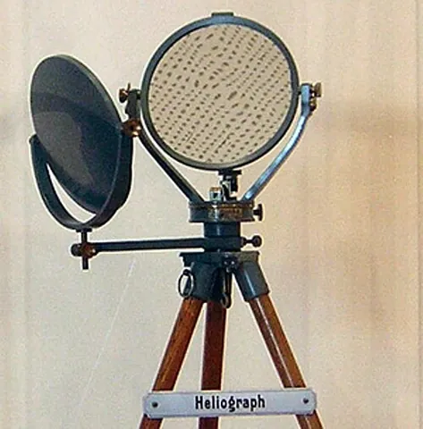 heliograph: an apparatus for signalling by means of a moveable mirror which reflects flashes of sunlight
