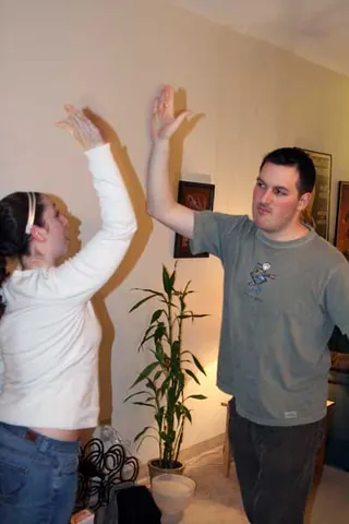 high five: a gesture of celebration or victory in which two people slap the palms of their hands together at...