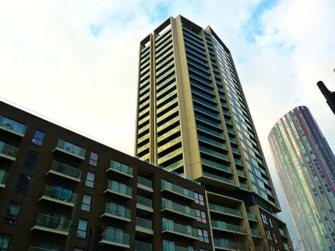 high-rise: a tall building, one consisting of many storeys