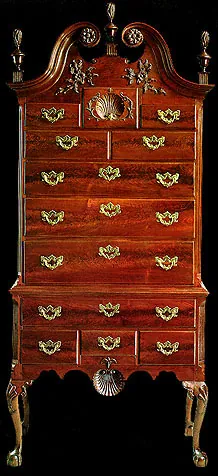 highboy: a tall chest of drawers that is raised up on high legs