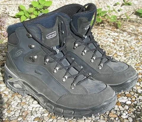 hiking boot: a type of resistant boot designed for hiking