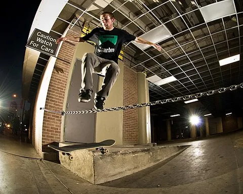 hippy jump: a trick in which the skateboarder jumps above the board, leaving it on the ground to pass under an...