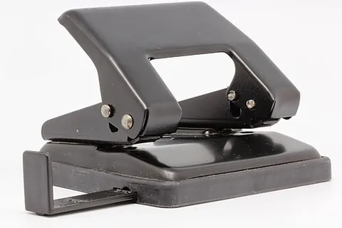 hole punch: a tool that is used to make holes in stationery for ease of filing