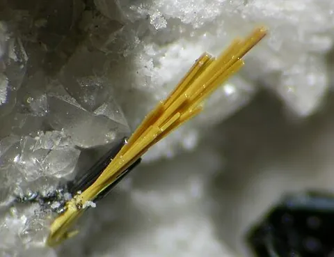 holfertite: a trigonal-pyramidal mineral containing calcium, hydrogen, iron, oxygen, potassium, titanium, and...