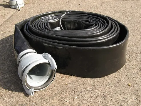 hose: a flexible tube conveying water or other fluid