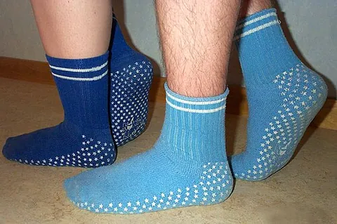 hospital sock: a type of sock, with a treaded sole, provided to patients at a hospital (including a mental...