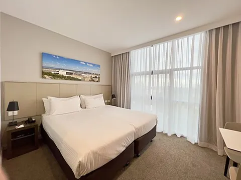 hotel room: a room at a hotel where a customer can spend the night