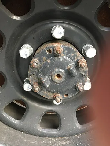 hub: the central part, usually cylindrical, of a wheel; the nave
