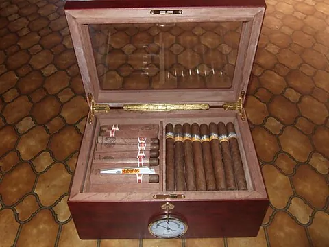 humidor: a container designed to keep its contents at a constant humidity; especially such a box for storing...