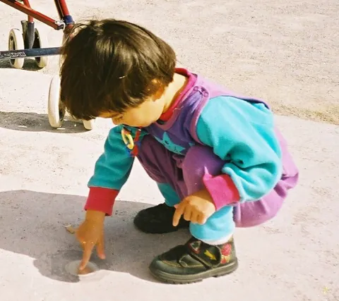 hunker: to crouch or squat close to the ground or lie down