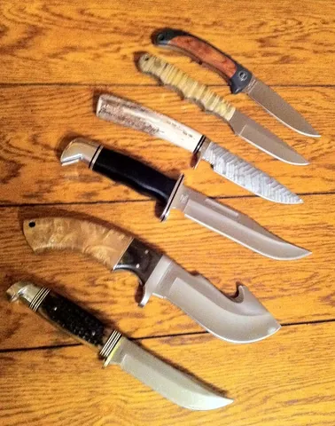 hunting knife: a knife optimized for use in hunting animals, usually with a substantial belly and sometimes with a...