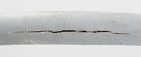 hydrogen embrittlement: the absorption of hydrogen into a metal, and subsequent weakening, as can happen in some situations...