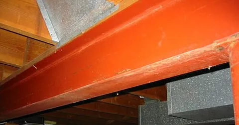 i-beam: a beam with cross-section shaped like a capital letter I (with serifs top and bottom), used in...