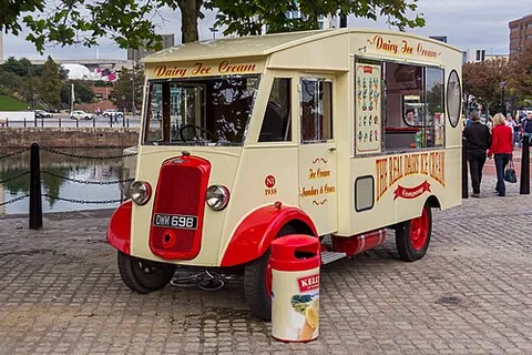 ice cream van: a vehicle from which ice cream is sold at the roadside, mostly to children