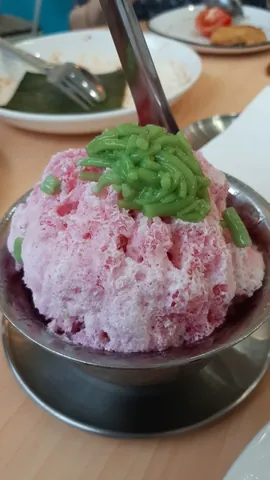ice kachang: a dessert made from crushed ice with syrup and jelly poured on top