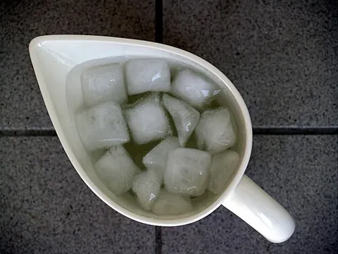 ice water: cold water for drinking, either chilled in ice, or with the addition of ice cubes