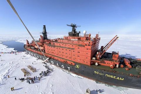 icebreaker: a ship designed to break through ice so that it, or other ships coming behind, can navigate on...