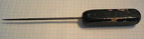 icepick: a pointed tool, shaped like an awl, used for breaking ice