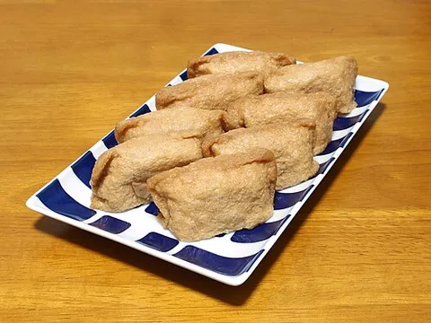 inarizushi: a form of sushi consisting of a pouch of fried tofu filled with rice