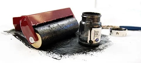india ink: a black ink, made from lampblack, used for printing and artwork