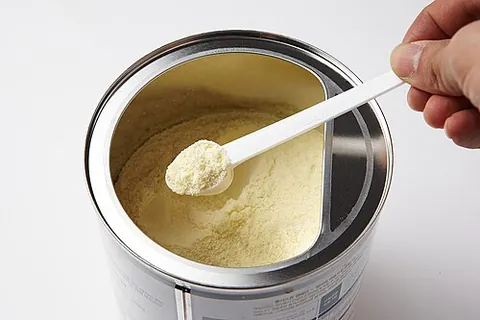 infant formula: a manufactured food simulating human breast milk, designed to be fed to babies and infants under...