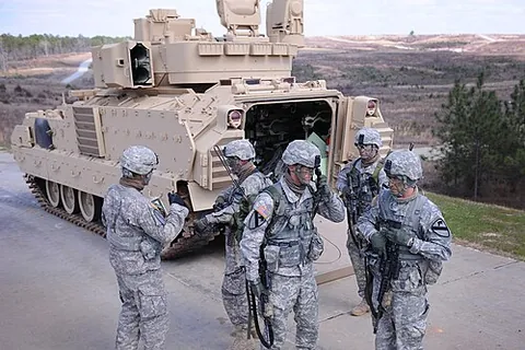 infantry fighting vehicle: an armoured combat vehicle designed to carry infantry soldiers and provide fire support for them